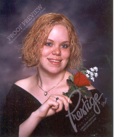 seniorpicwithflower.jpg